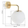 Lampa ścienna typu kinkiet SIENA, złota konstrukcja, biała szklana kula, styl nowoczesny glamour